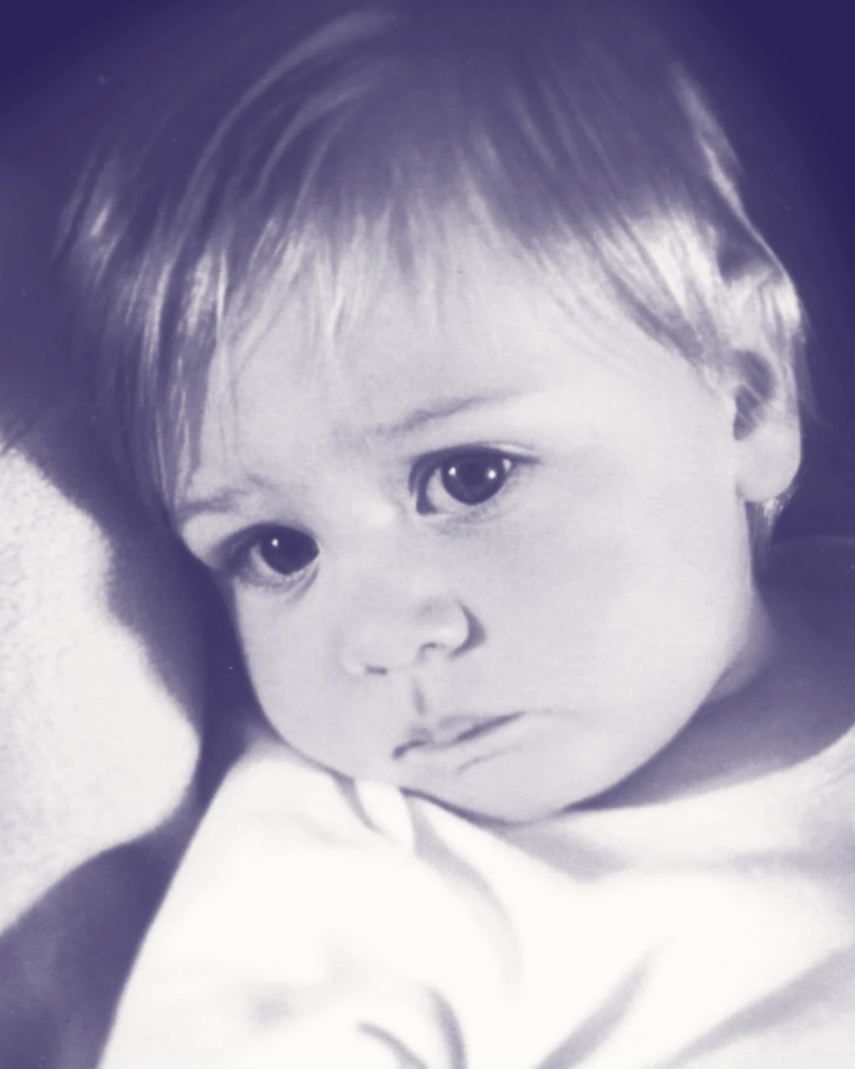 A young child, the photograph behind the creed